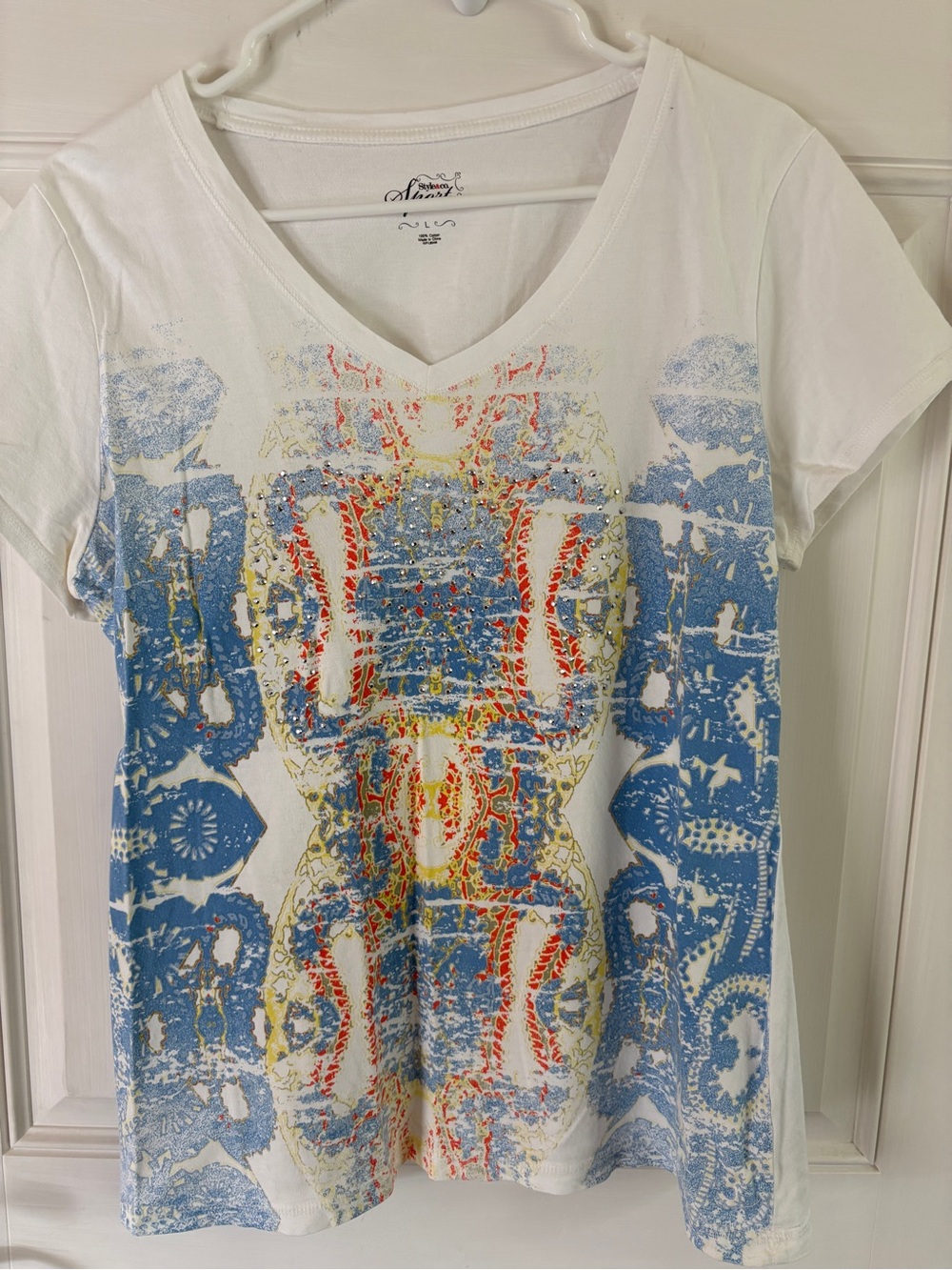 White V-Neck Graphic Tee with Blue Accent